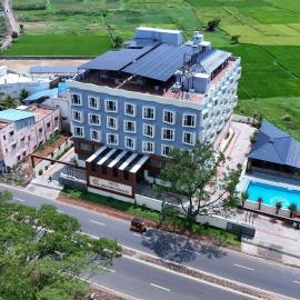 Hotel Krithick grand, hotell i Theni