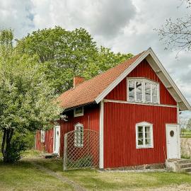Traditional Red House By The Lake In Småland
