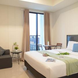 Spacious and Homey Studio at Cleon Park Apartment By Travelio