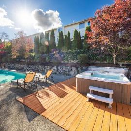 Stylish 4BR retreat with pool & year-round hot tub