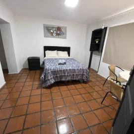 Habitación doble superior en el centro, con baño