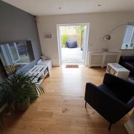 Spacious 3-Bed Home with Private Gym & Garden