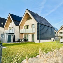 Kleine Freiheit, Büsum - modernes Ferienhaus in direkter Meernähe mit Terrasse, Garten und eigenem Parkplatz