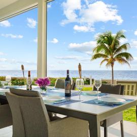 26 Sunset Point Vacations Luxury Oceanfront Condo with Private Garden West Bay, hotel in West Bay