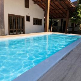 Residência Encantos do Mar، فندق في إيتاكاري