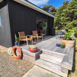 Hosts on the Coast Fernhaven Cabin