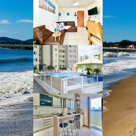 Apartamento a 400M PRAIA com PISCINA sacada com CHURRASQUEIRA privativa Wi-Fi Portaria 24h PLAYGROUND INFANTIL vaga privativa de GARAGEM Reserve agora mesmo