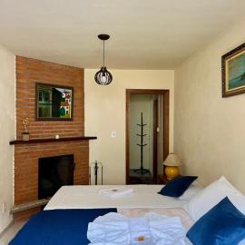 Casa Moreira´s Chalés, hotel i Monte Verde
