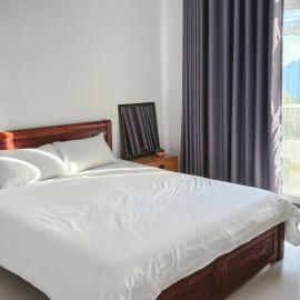 Phòng ngủ giường đôi ban công Sol homesay