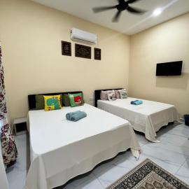 Roomstay Nasi ayam kak Nor paya pulai, viešbutis mieste Temerlu