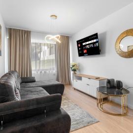 Apartament 1 C4 Grand Chalet Poiana Brasov, hôtel à Braşov