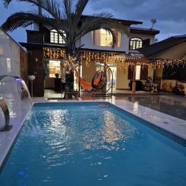 Comfortable house in Praia do Sonho - 10 people, hotel in Palhoça