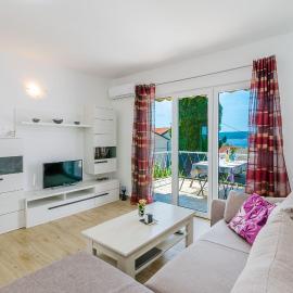 Bezauberndes Apartment nur 240 Meter zum Strand mit Meerblick, Grill, Klima