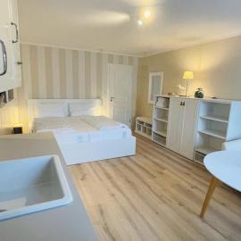 Landhaus am Meer - Whg 5 Hilligenlei, hotel em Utersum