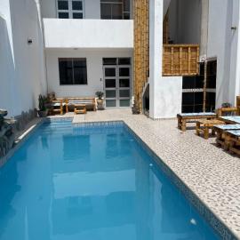 Olas inn, hotel v destinácii Asia