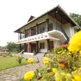 Mango Village Resort, hotel en Kollengode