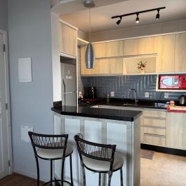 Lindo apartamento completo e com garagem coberta