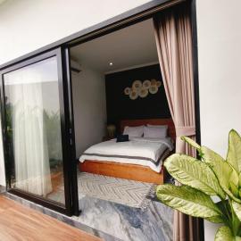 Santo Guesthouse, hotel in Canggu
