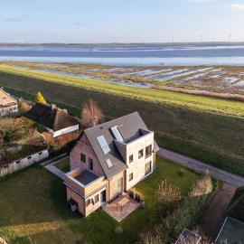 Deichkoje12 Deck 1 EG direkt am Eiderdeich nur 7 km bis zur Nordsee und 20 Min bis Sankt Peter Ording