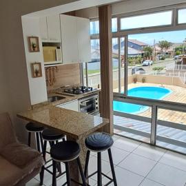 Apartamento com piscina, apenas 200 metros do mar, hotel a Capão da Canoa
