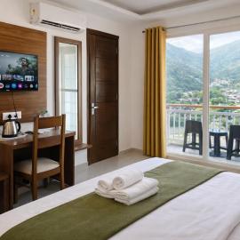 Ima Ganga Hotel - Aesthetic, Quite Mountain View Rooms In Upper Tapovan with netflix, free airport pickup for 7 or more nights booking