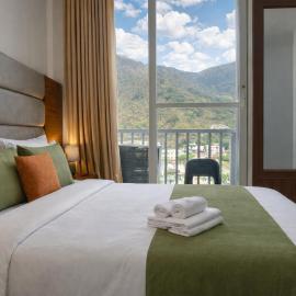 Ima Ganga Hotel - Aesthetic, Quite Mountain View Rooms In Upper Tapovan with netflix, free airport pickup for 7 or more nights booking