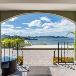 Luxury Condo with Panoramic Ocean Views, Sparkling Infinity Pool, and Modern Open-Concept Design