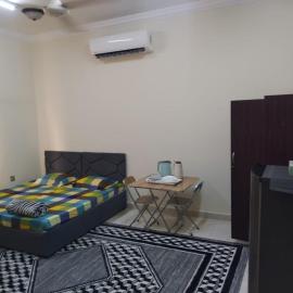 Private Rooms For Rent Near Airport - Raha Hostel, hotel di Ḩayl Āl ‘Umayr