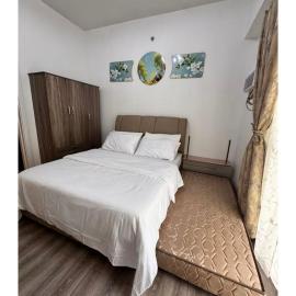 Amani Grand Resort Residences Near Mactan Airport, hotel in Pusok