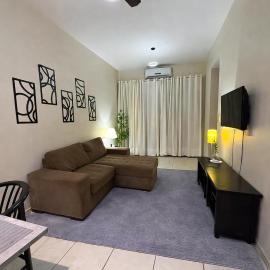 Flat central com estacionamento