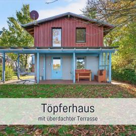 Ferienhaus Töpferhaus - strandnah, haustierfreundlich, Kaminofen, Garten, Platz für 3 Erwachsene, 2 Kinder