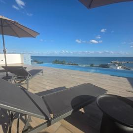 MIRAMARE Ocean View โรงแรมในปูแอร์โต โมเรลอส