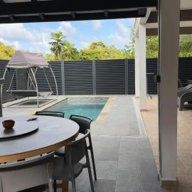 Évasion Créole Détente tropicale avec piscine, jacuzzi et plage à proximité!, hotel i La Trinité