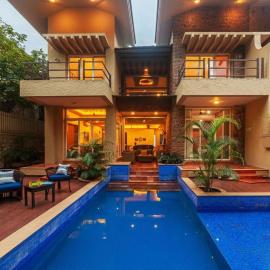 StayVista's The Happy Hive - Cozy rooms and a pool for a delightful stay