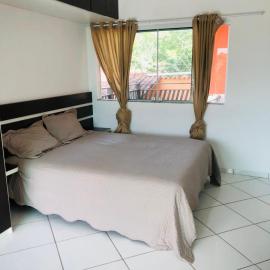 Casa de Praia com Varandao Gourmet a 5 min do Mar