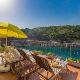 Holiday house BELLA MARE with sea view 50m from the beach in a quiet location in Vrbnik on Krk island, Hotel in Vrbnik