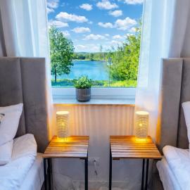 Unique View Apartment - 3pok, 4 łóżka, widok na rzekę, centrum, Netflix, parking, winda, hotel i Iława
