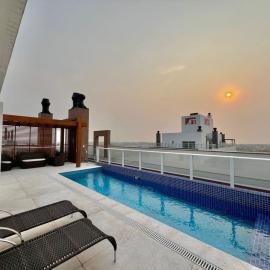 Excelente localização e acomodação, apartamento novo, próximo ao mar, hotel in Capão da Canoa