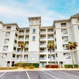 Oceanview condo with resort amenities, balcony and private beach access