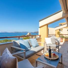 ClickSardegna Attic Vittoria with terrace facing the sea and parking space