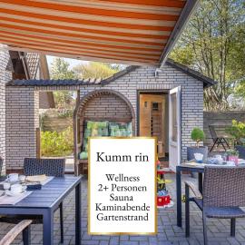 Fewo Kumm rin - Ihre private Nordsee-Oase direkt hinter dem Deich - privater Gartenstrand - Sauna & Kamin - Vieles für den kleinen Gast, hotel i Carolinensiel
