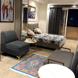Sunset view Studio by Sky 5 Homestays