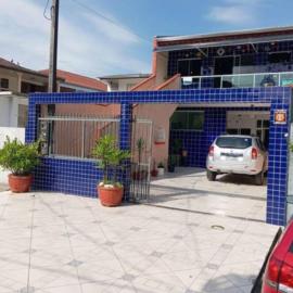 Espaço Privativo no Andar Superior Proximo da Praia، فندق في ماتينيوس