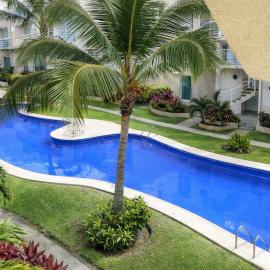 Departamento en Marina Diamante con lago y alberca