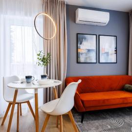 M1 Aura Apartments With AC, Free Parking by StayNest