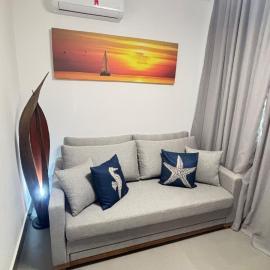 Novo Flat a poucos metros da praia na entrada 12