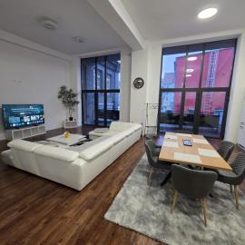 Urban loft with gallery & XXL sofa bed