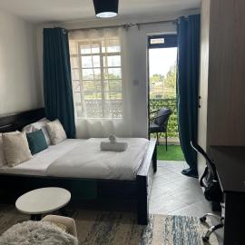 JOJO Staycations، فندق في Rungiri
