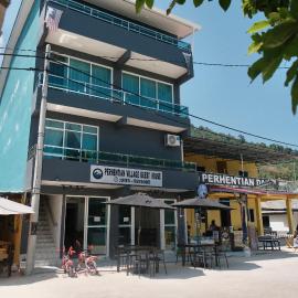 Perhentian Village Guest House، فندق في بيرهينتيان