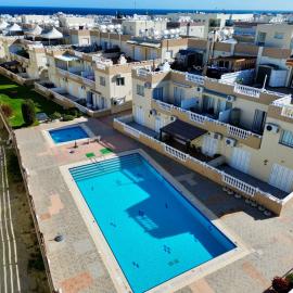 AquaSol Suite Modern 2BR with Shared Pool
